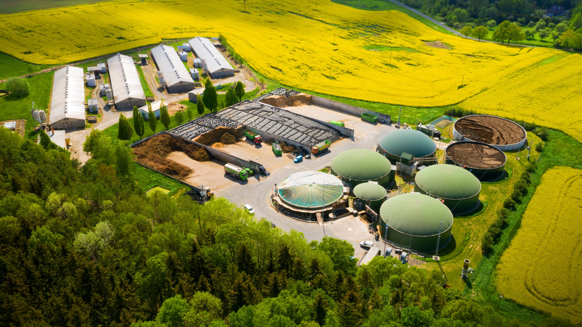Biogas plant in agricultural landscape.
